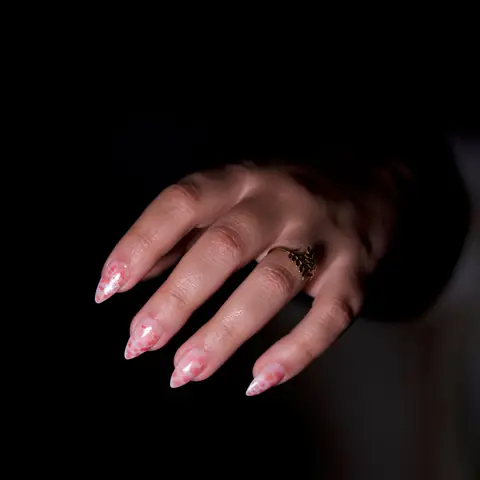 French tip acrylic nails with a glitter accent nail